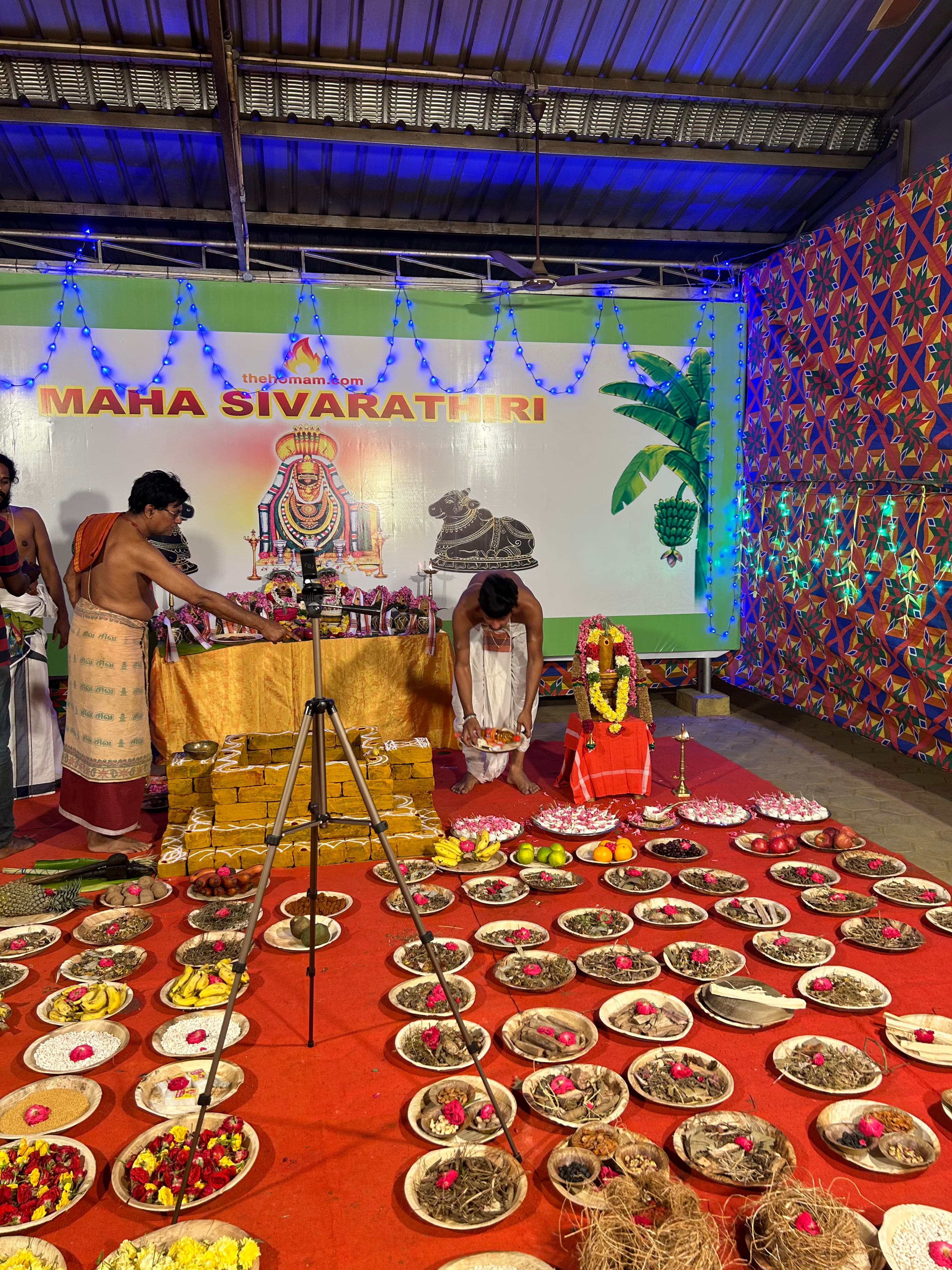 Decorated altar with flowers and lamps